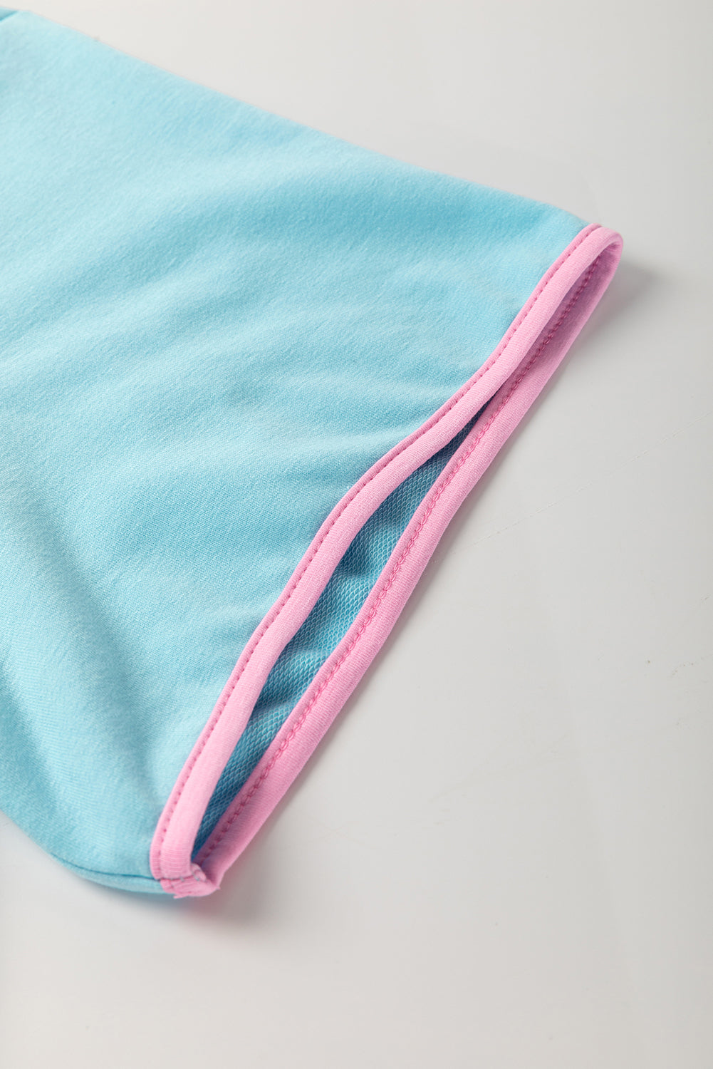 Turquoise plus size contrast trim T-shirt and skirt two-piece loungewear set by Modern Grace, with polyester, cotton, and elastane fabric.