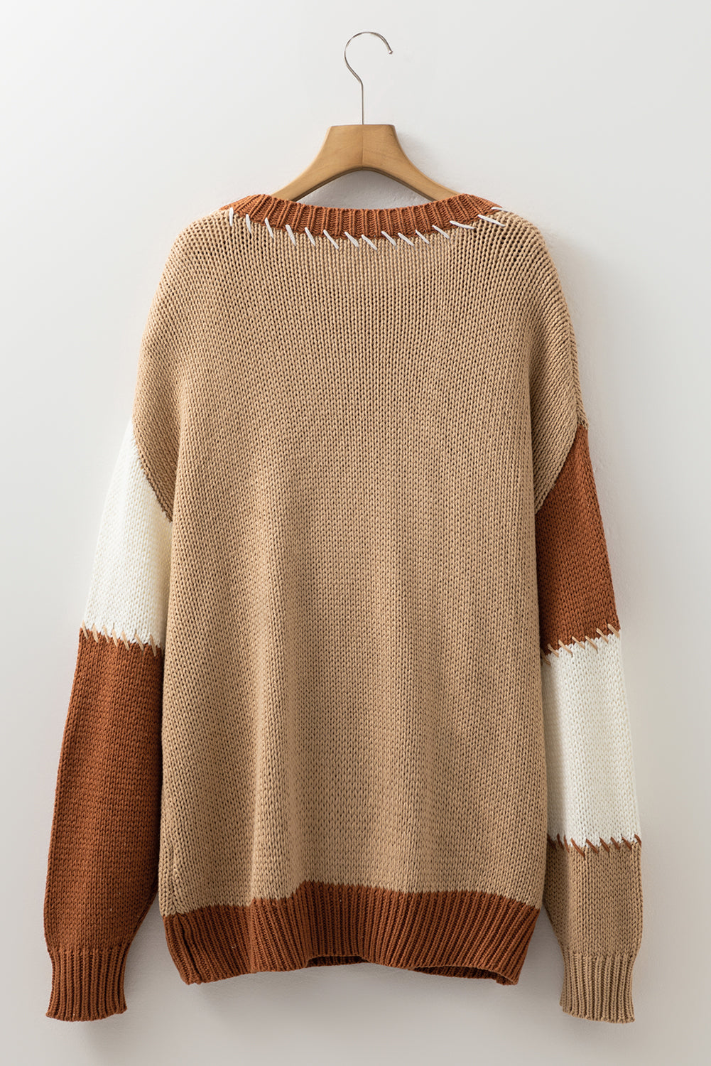 Plus size Modern Grace French beige stitch detail color block knitted sweater with a curvy fit, ideal for stylish, comfortable winter wear.