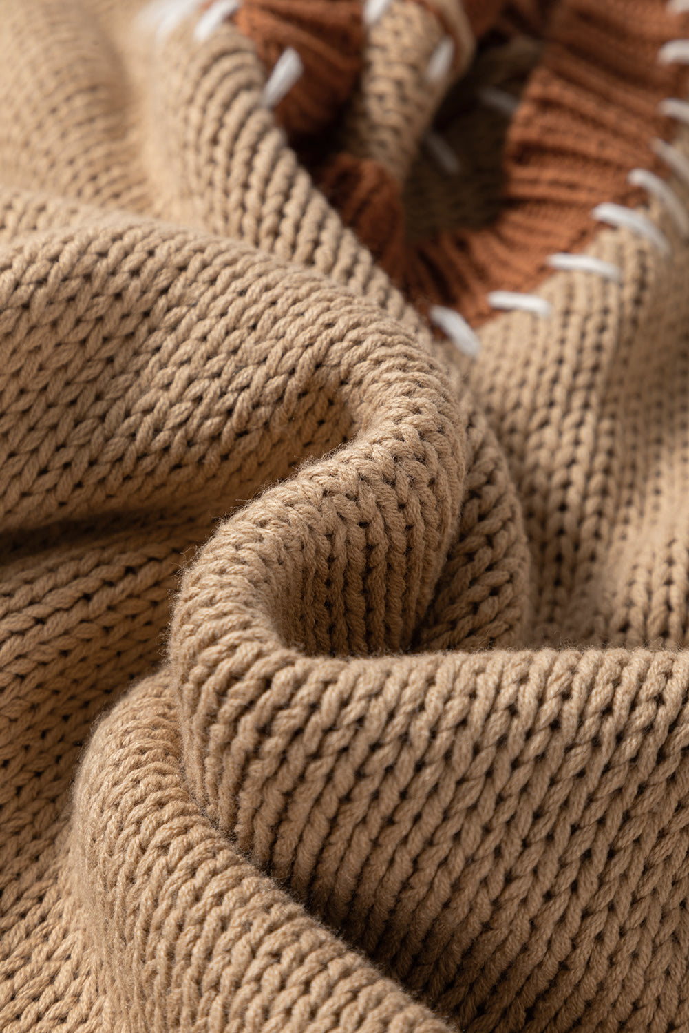 Plus size French beige knitted sweater with color block design and stitch detail by Modern Grace, perfect for cozy, stylish wear.