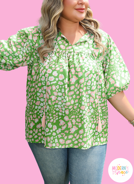 Green plus size floral blouse with tassel tie, split neck, and puff sleeves by Modern Grace, perfect for stylish, comfortable wear.