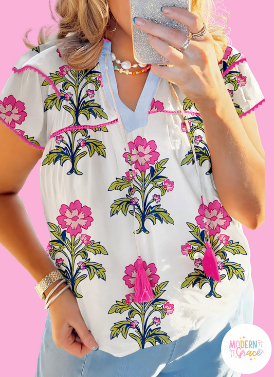 Plus size summer blouse by Modern Grace with vintage floral print, contrast notched V-neck, and short sleeves, ideal for warm weather.