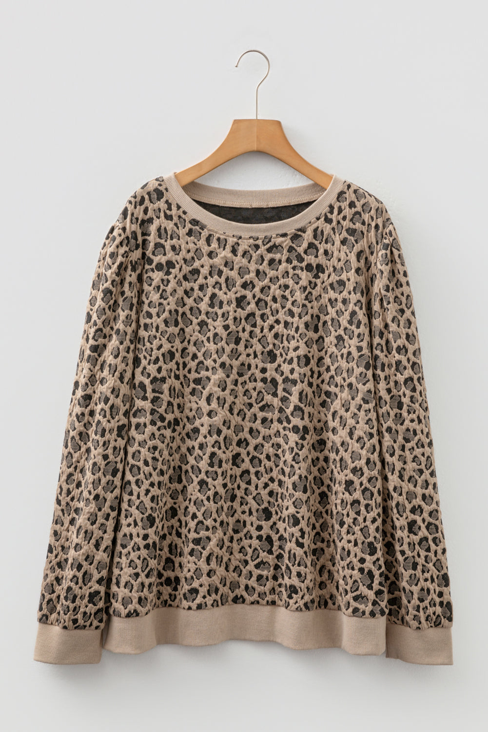 Modern Grace khaki leopard textured ribbed trim plus size long sleeve top, showing the detailed fabric and fit.