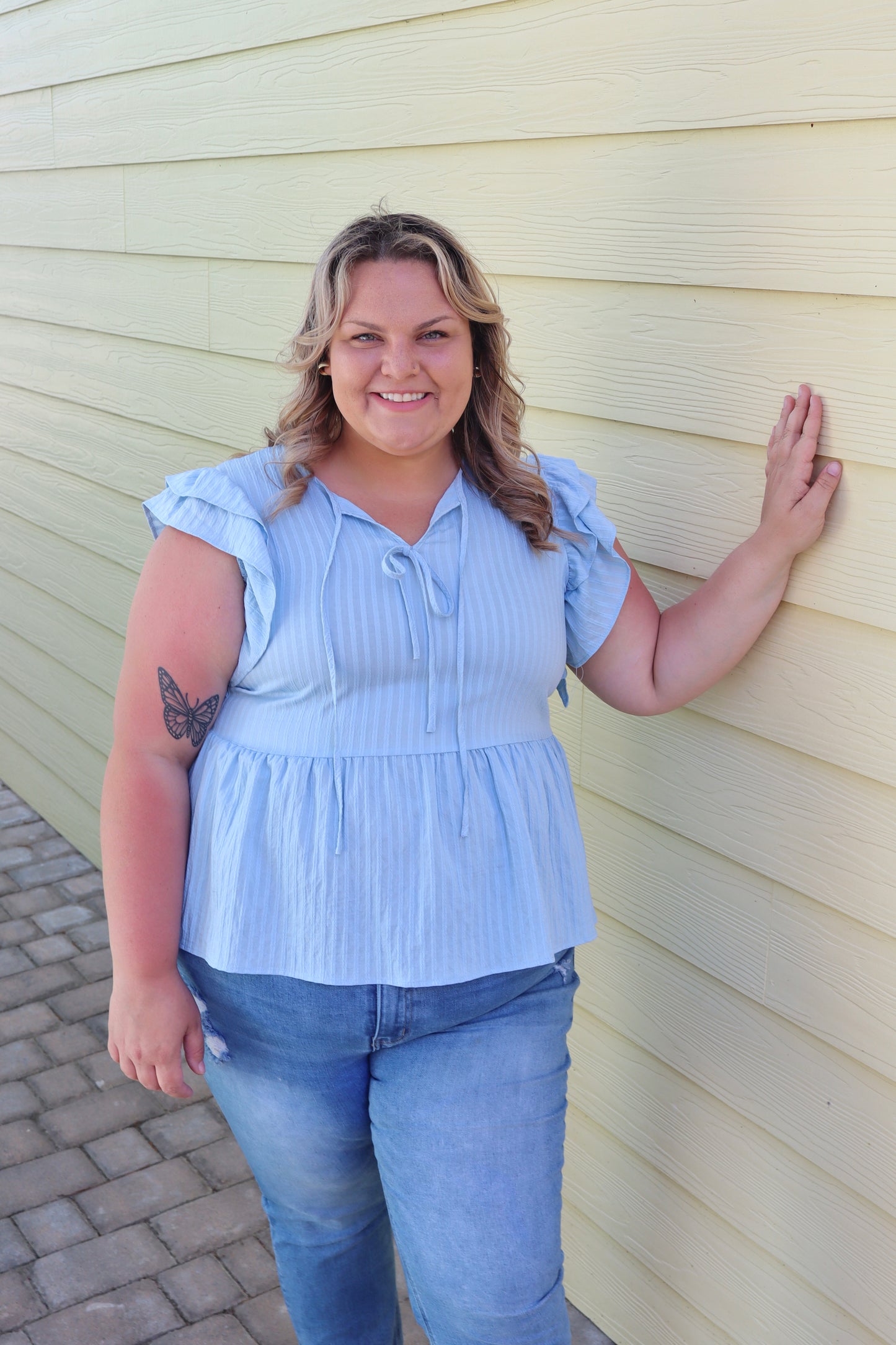 Plus size Curvy Blue Flutter Sleeve Top by Modern Grace featuring flowy fabric and stylish flutter sleeves.