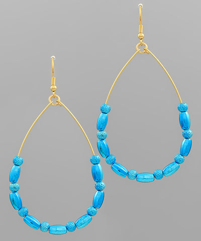 Beaded teardrop earrings by Modern Grace featuring intricate beadwork and a stylish teardrop shape for elegant wear.