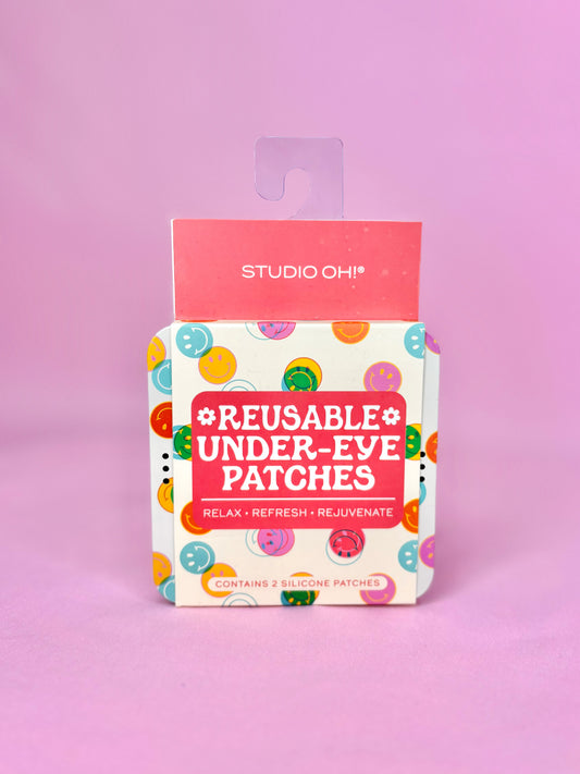 Modern Grace Happy Vibes reusable under-eye patches for skincare, shown on a clean, bright surface with the product packaging.
