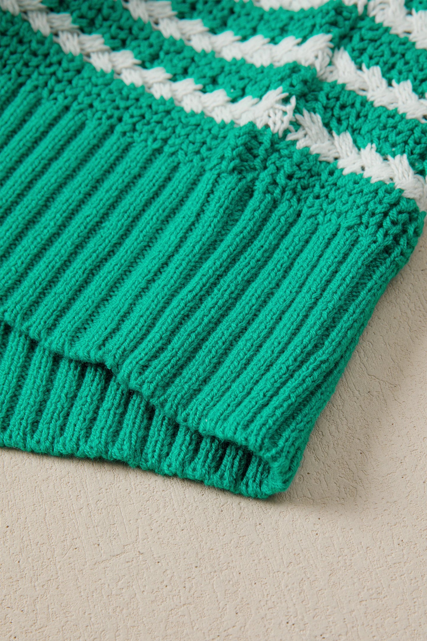 Green stripe short sleeve V-neck sweater with bow knot detail by Modern Grace, showcasing a stylish and casual knitwear design.