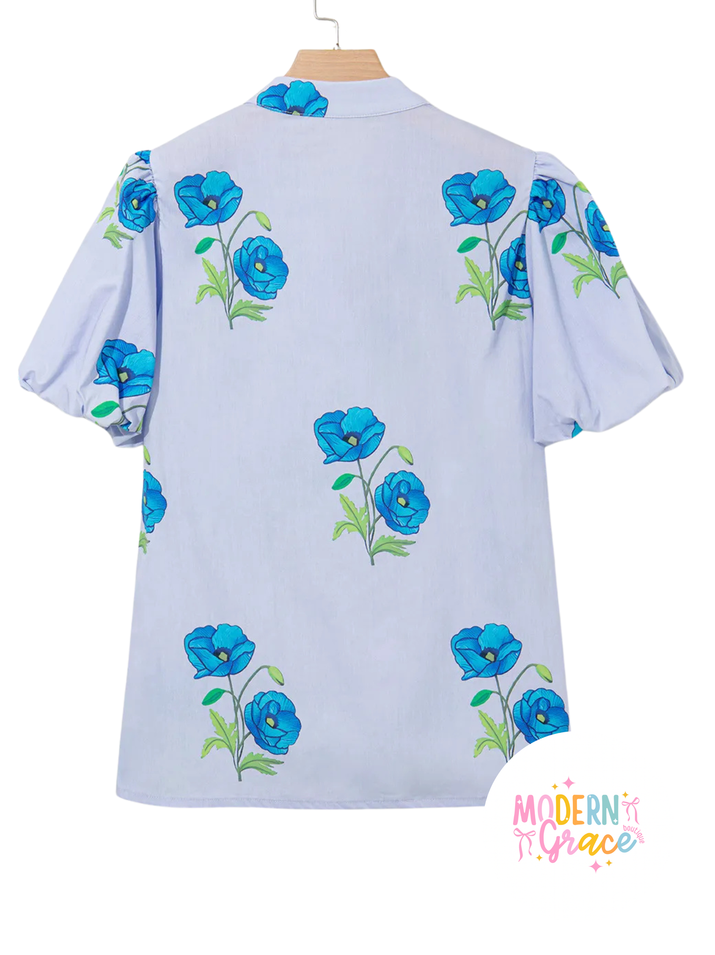 Sky blue floral print blouse by Modern Grace, tie-front, split neck, short puff sleeves, lightweight and stylish for casual wear.