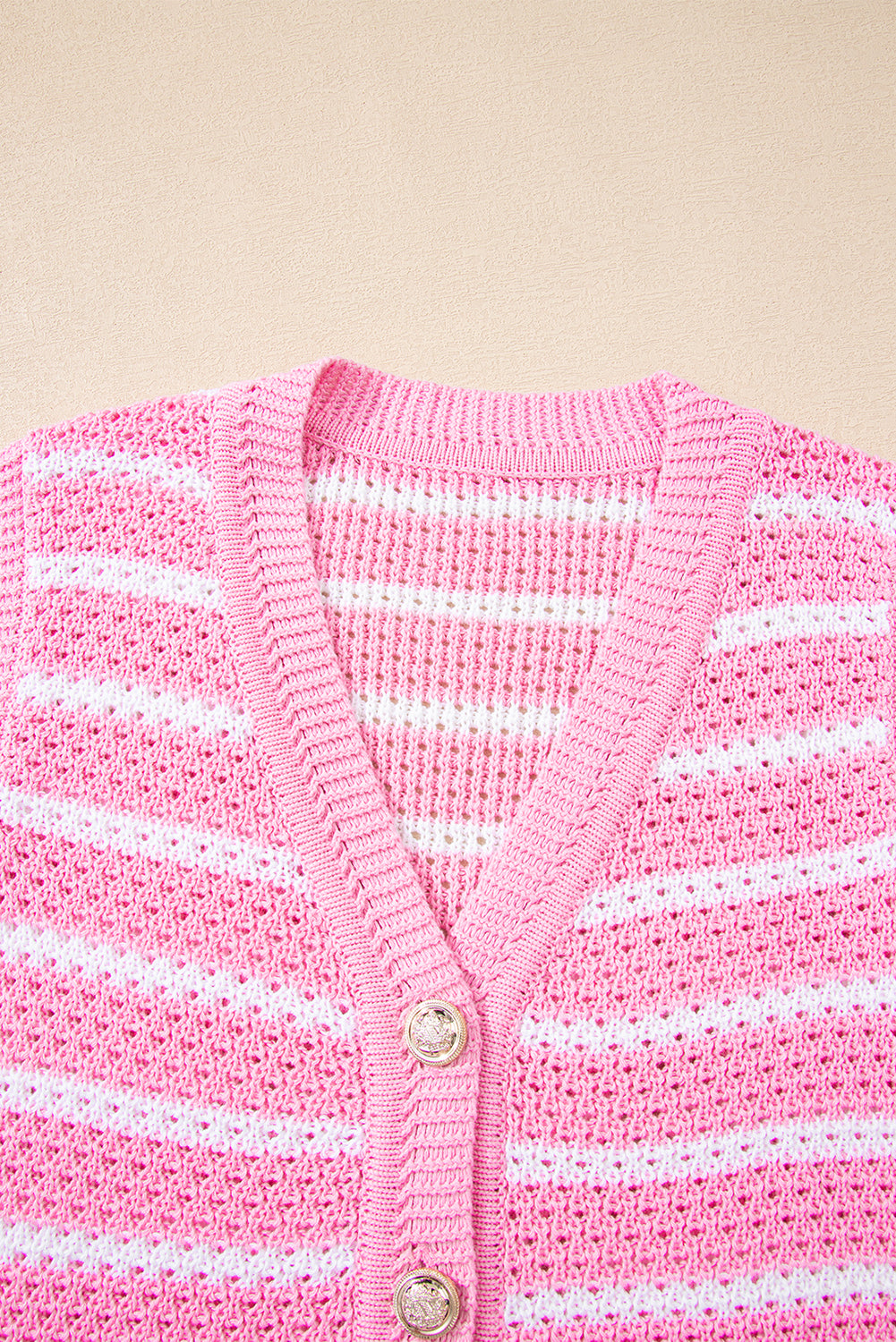 Modern Grace pink stripe V-neck sweater vest with gold buttons, featuring a stylish design in acrylic and cotton fabric.