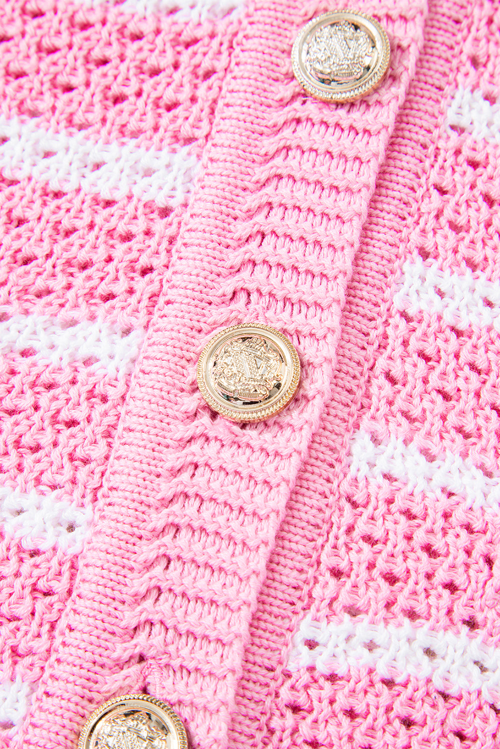Pink stripe V-neck sweater vest by Modern Grace featuring gold buttons, soft acrylic and cotton blend, elegant and stylish.