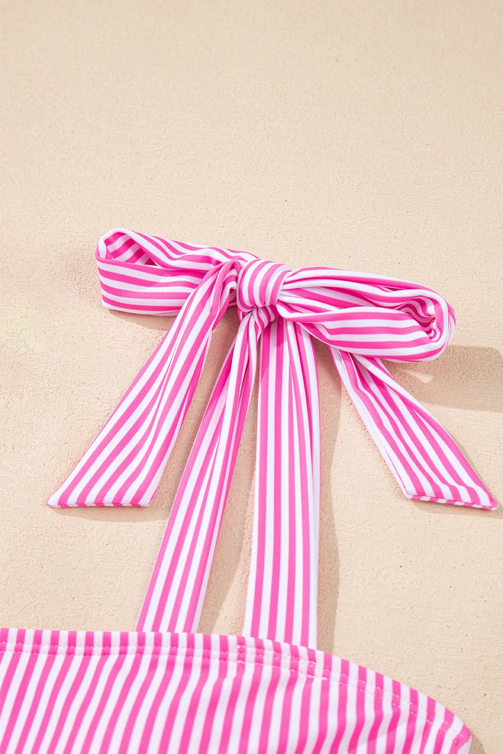 Modern Grace rose stripe knot strap high waist bikini top, stylish swimwear with a flattering fit and vibrant pattern.