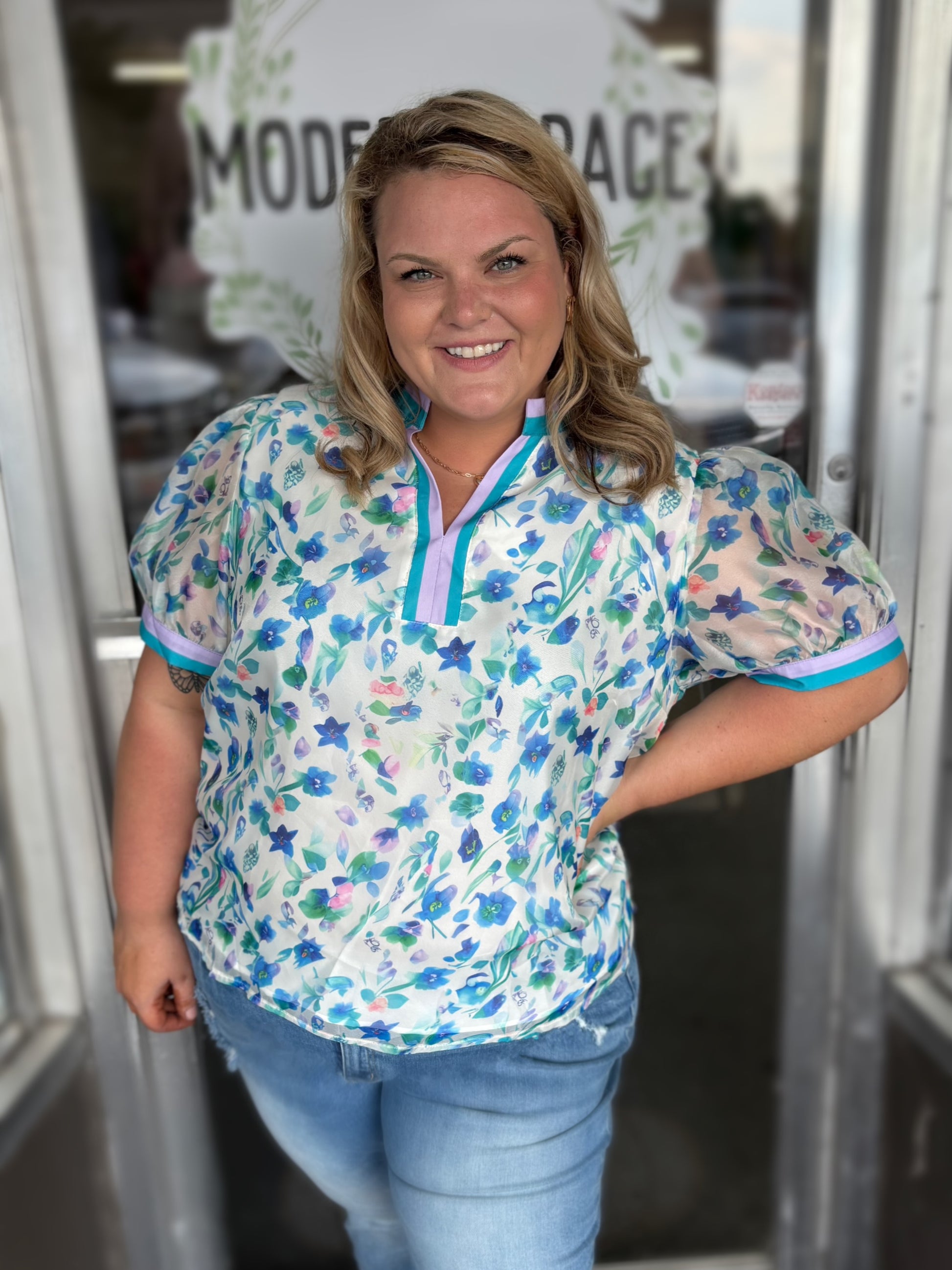 Curvy green floral print colorblock top by Modern Grace featuring a stylish design and vibrant floral pattern.