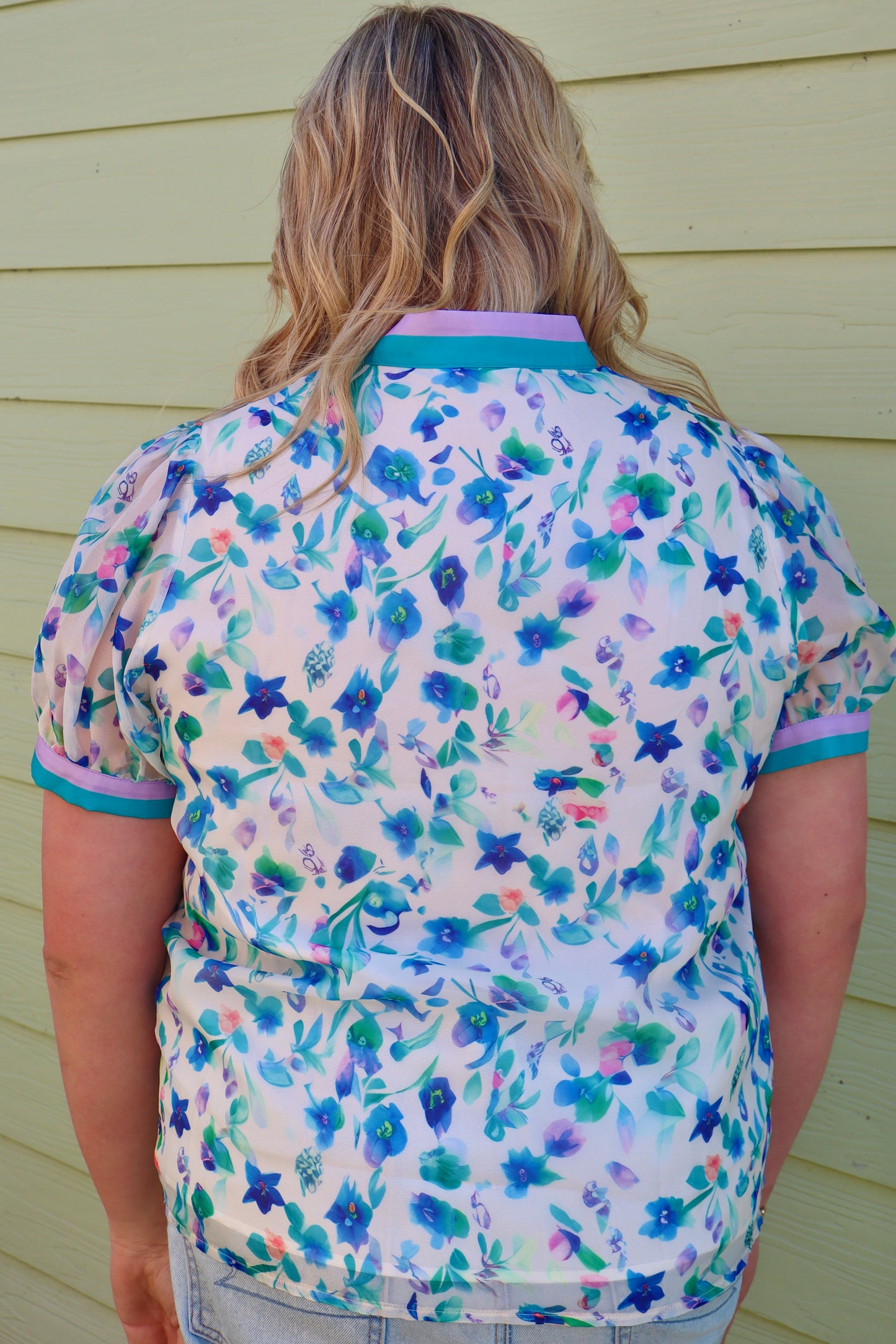 Curvy green floral print colorblock top by Modern Grace featuring a stylish design and vibrant pattern.