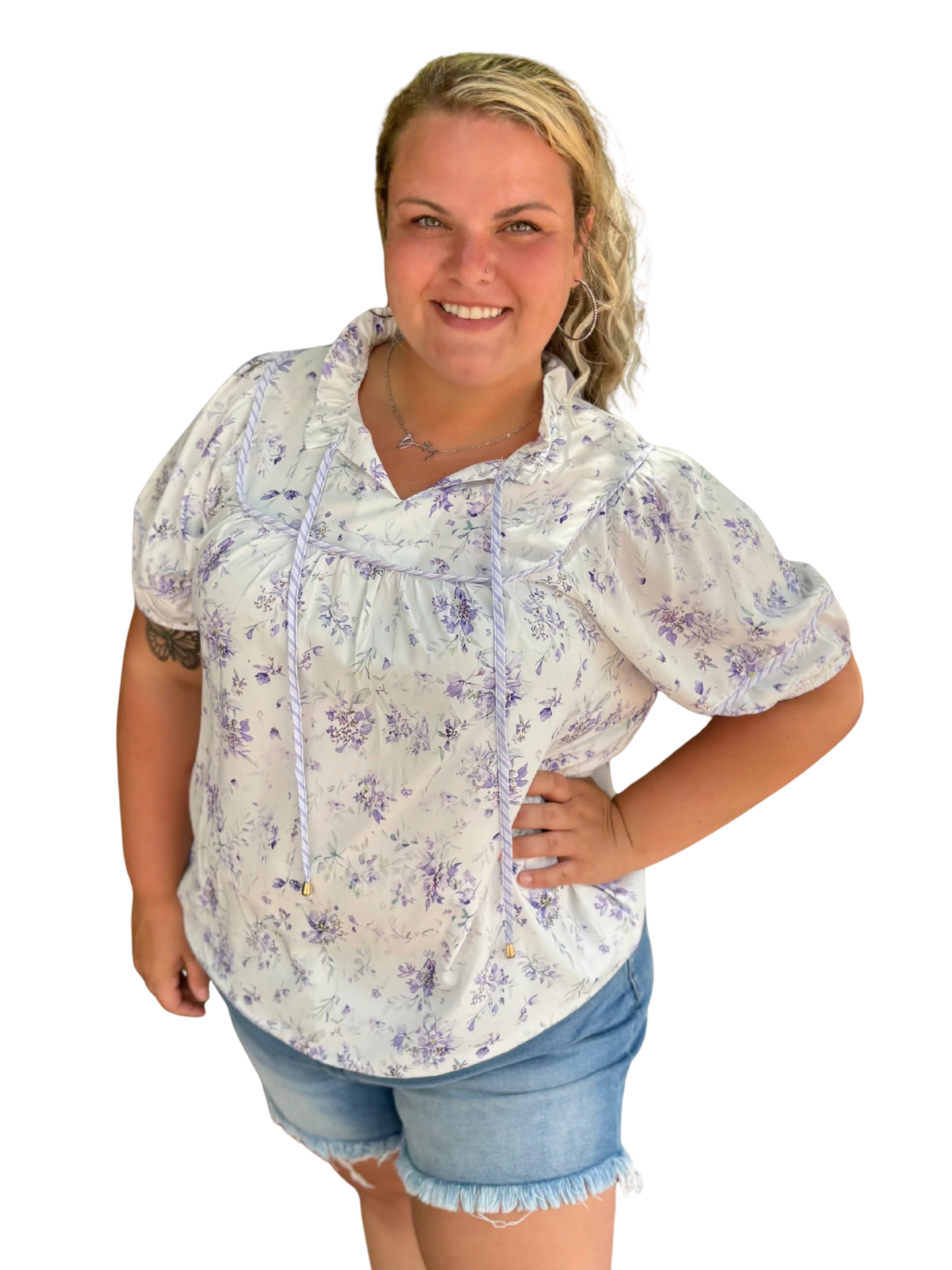 Modern Grace curvy purple floral top with long sleeves and a V-neck, featuring a vibrant floral pattern and fitted silhouette.