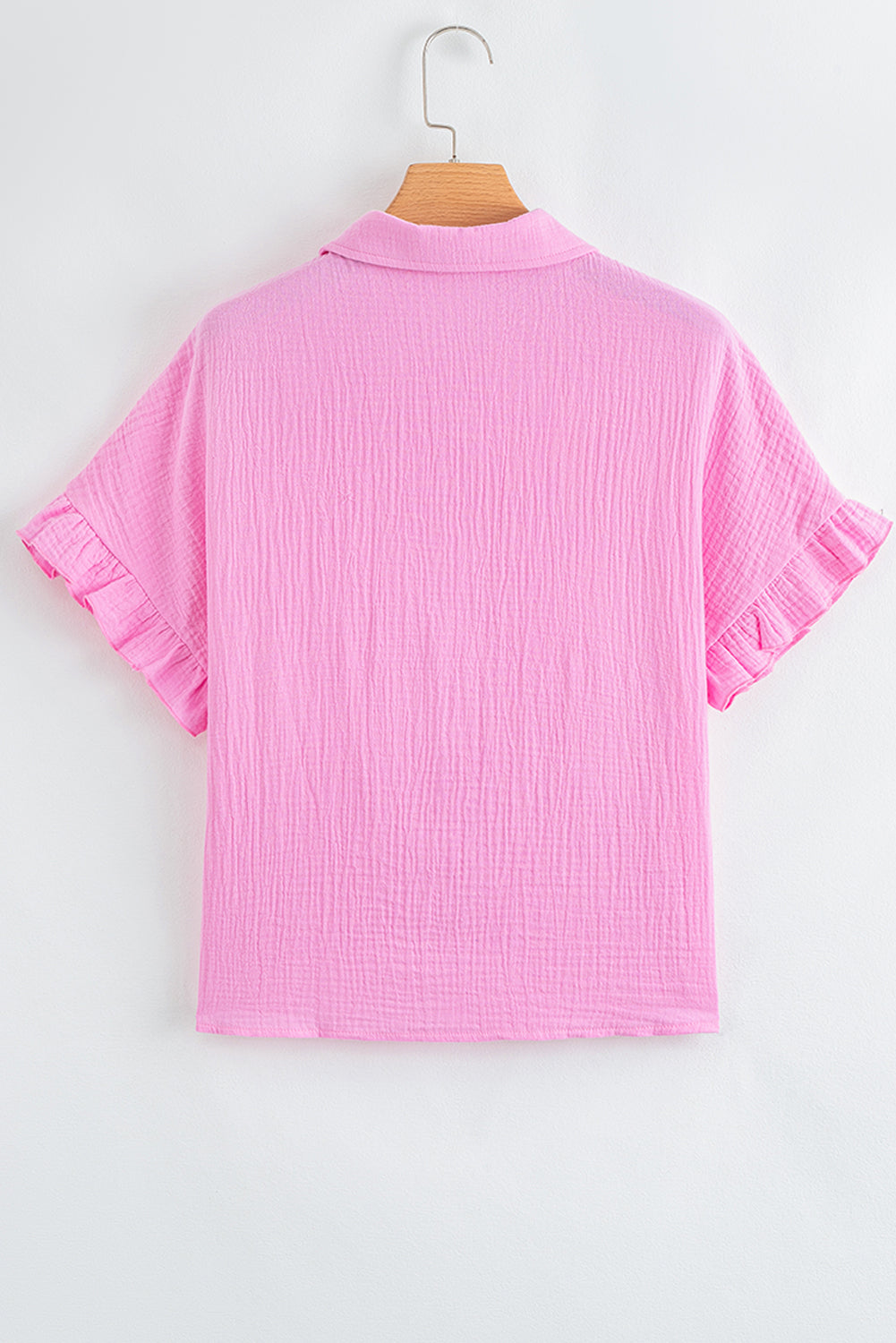 Modern Grace Bonbon Mineral Wash Short Sleeve Shirt with textured fabric and ruffle trim, made from 100% cotton.