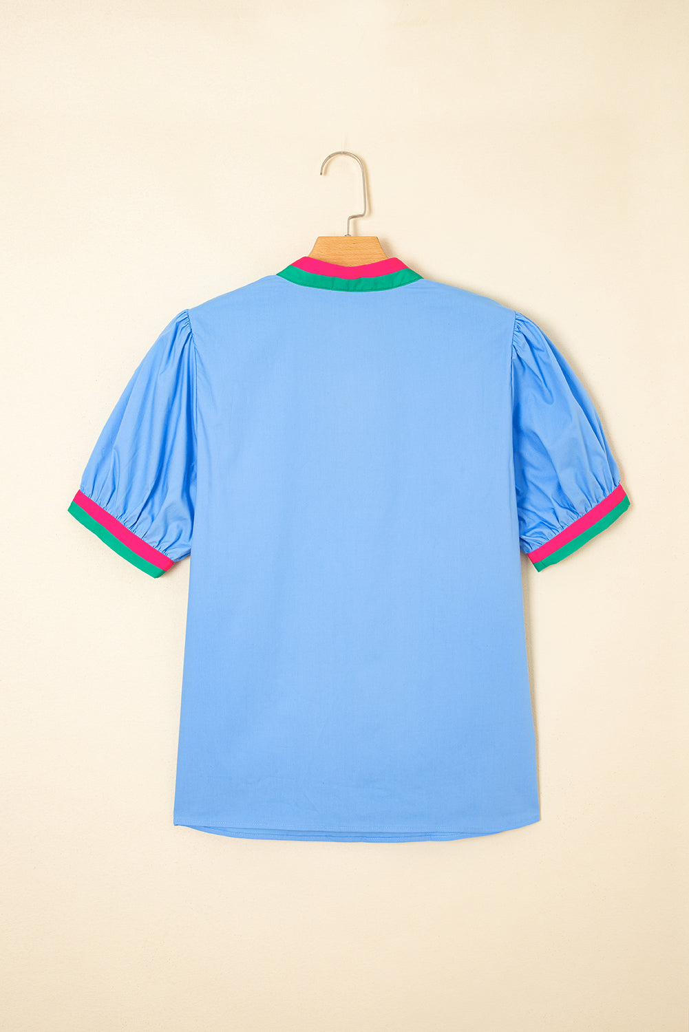 Sky blue striped V-neck blouse with short puff sleeves from Modern Grace, made of 100% cotton, featuring a stylish and casual design.