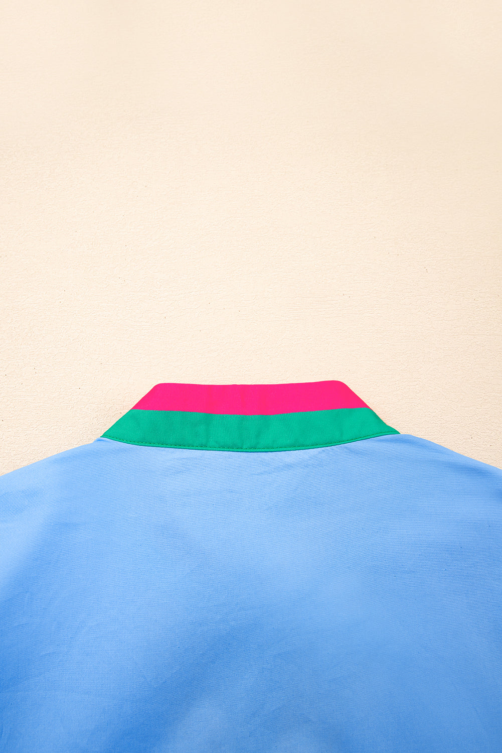 Sky blue striped V-neck blouse by Modern Grace with short puff sleeves, made of 100% cotton, perfect for casual or office wear.