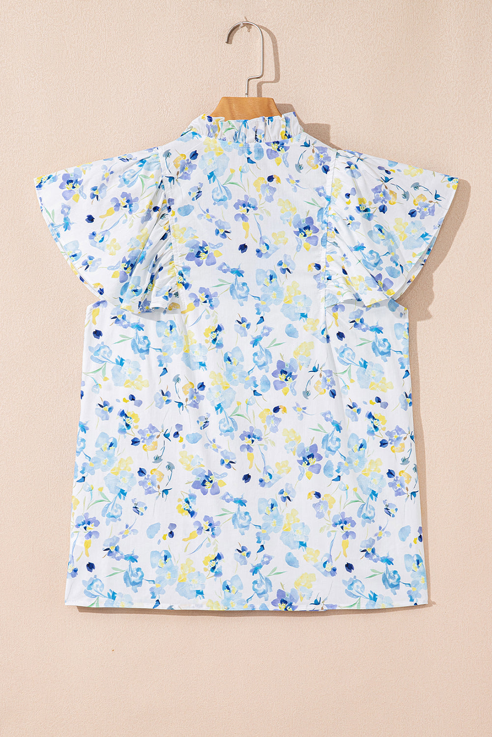 Sky blue floral print blouse by Modern Grace featuring a frilled notched V-neck and lightweight cotton-viscose fabric.