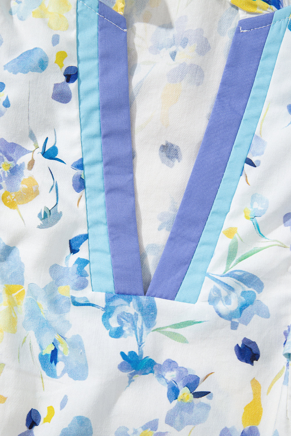 Sky blue floral print blouse by Modern Grace featuring a frilled notched V-neck and lightweight cotton-viscose fabric.