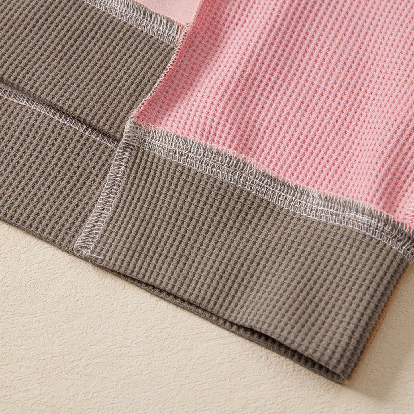 Light pink color block mix texture waffle patchwork oversized sweatshirt by Modern Grace, showcasing soft fabric and stylish design.