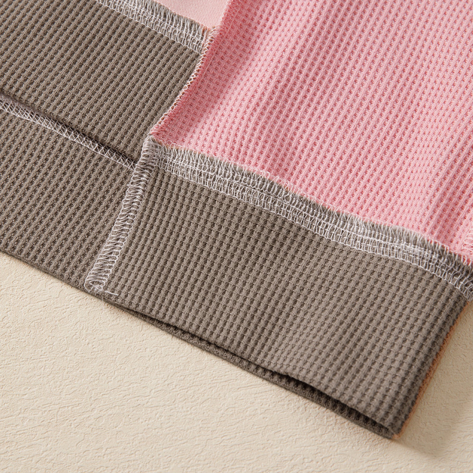 Light pink color block mix texture waffle patchwork oversized sweatshirt by Modern Grace, showcasing soft fabric and stylish design.