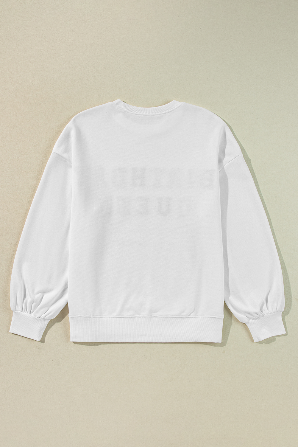 White Birthday Queen graphic sweatshirt with balloon sleeves by Modern Grace, featuring bold birthday-themed design and soft fabric.