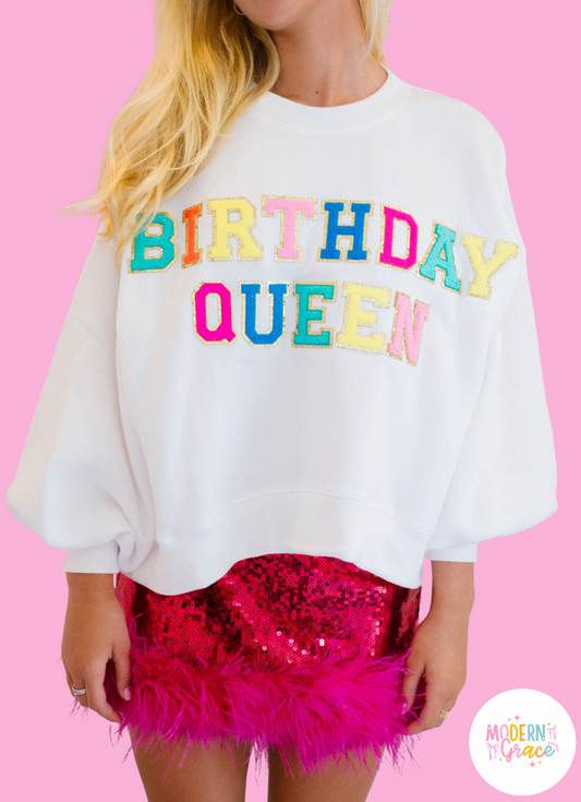 White Birthday Queen graphic sweatshirt with balloon sleeves by Modern Grace, featuring bold birthday-themed design.