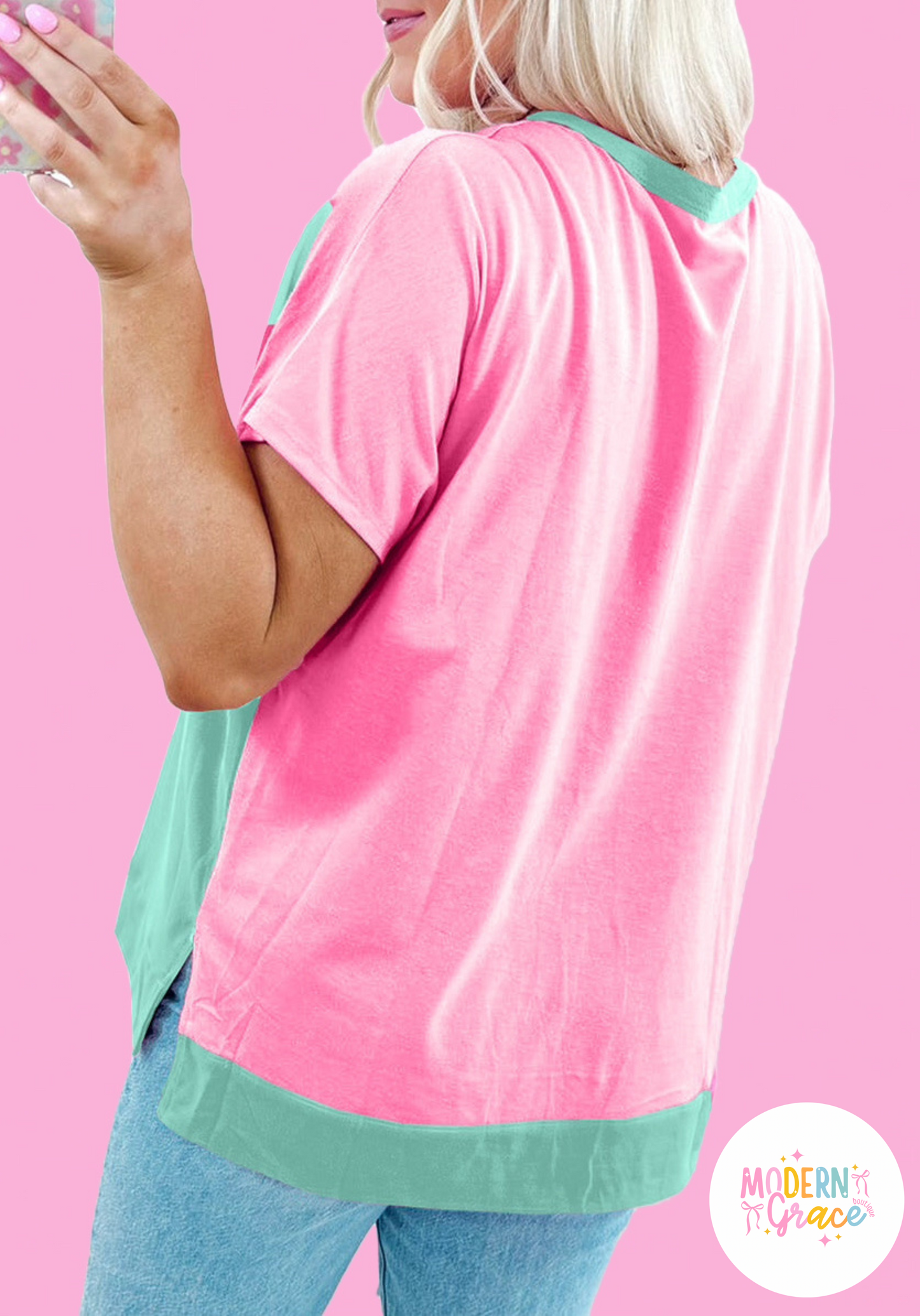 Mint green two-tone collared T-shirt by Modern Grace featuring half buttons and short sleeves, made of cotton and elastane.