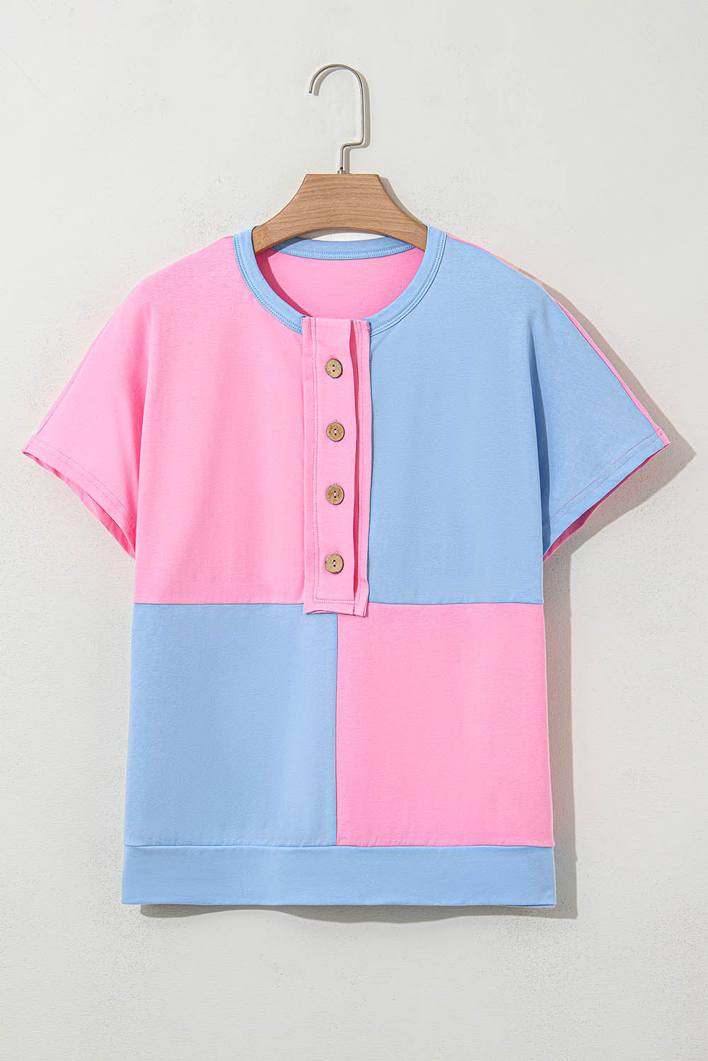 Modern Grace Myosotis two-tone half-button collared T-shirt, stylish top with contrasting colors and collar detail.