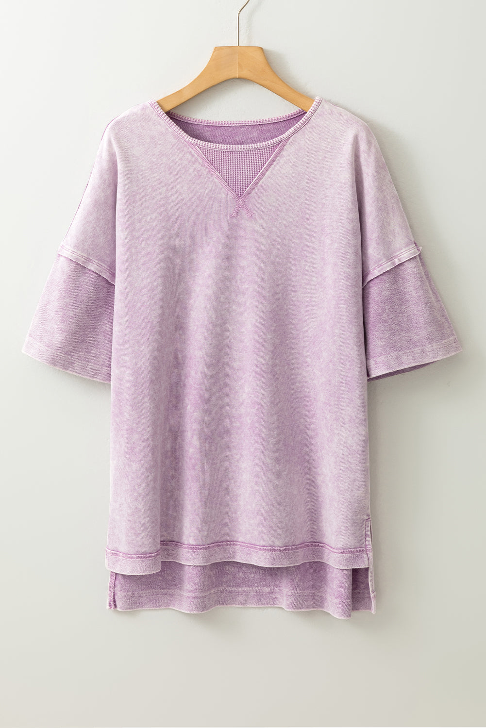 Modern Grace Orchid Petal Mineral Wash oversized drop shoulder tee with exposed seams, relaxed fit, in a soft, natural fabric.