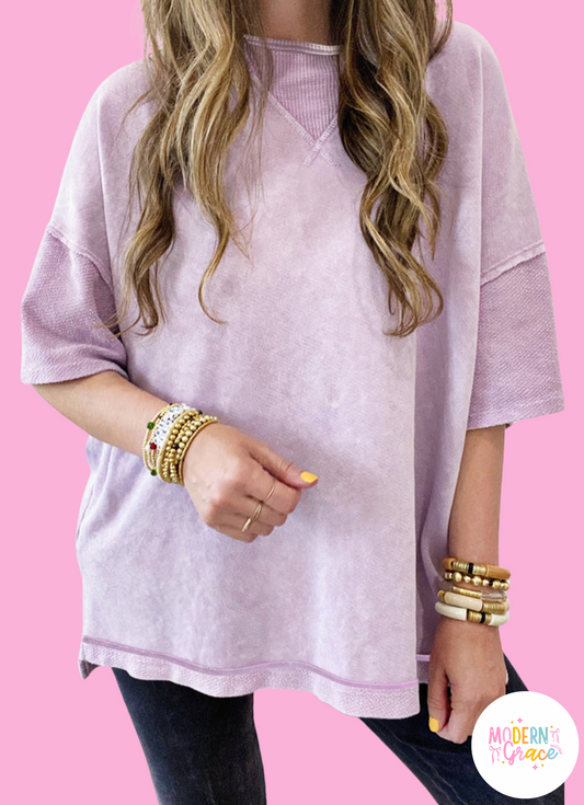 Modern Grace Orchid Petal Mineral Wash oversized drop shoulder tee with exposed seams, relaxed fit, and casual style.