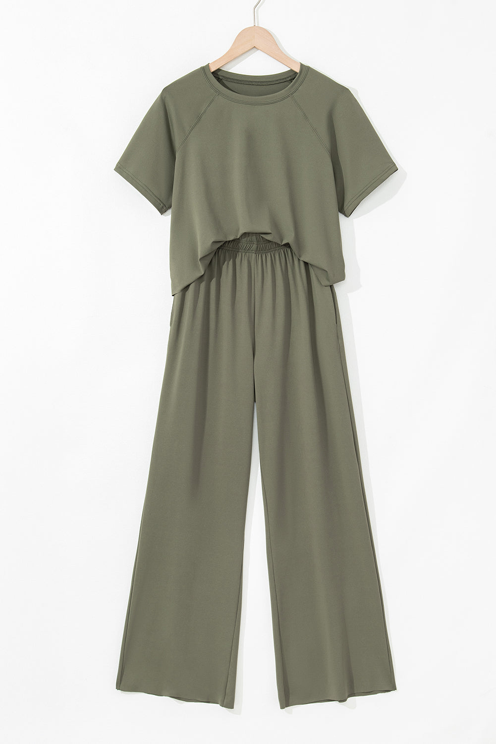 Modern Grace Seagrass raw hem loose tee and wide-leg pants set, two-piece casual style, with soft fabric and relaxed fit.