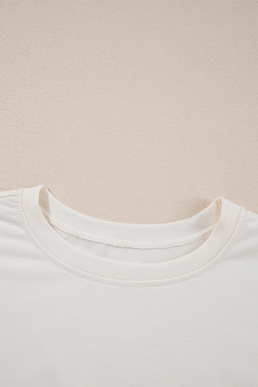 Beige cropped tee and high waist skort set by Modern Grace, casual two-piece outfit, lightweight polyester and cotton fabric.