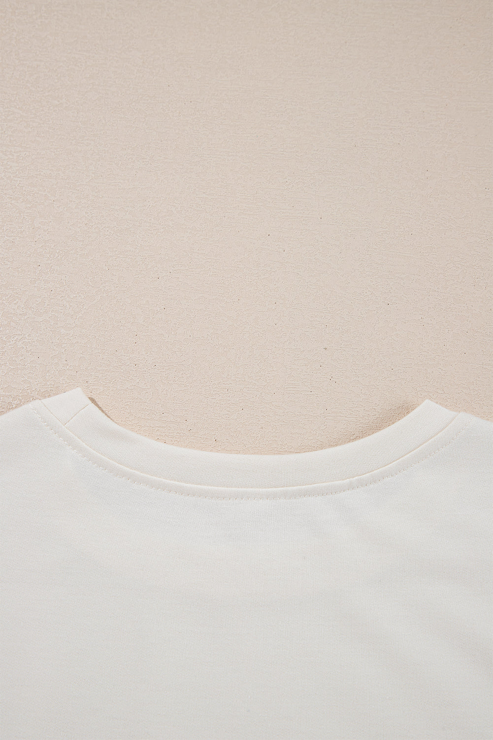 Beige cropped tee and high-waist skort set by Modern Grace, stylish two-piece short set with breathable fabric and comfortable fit.