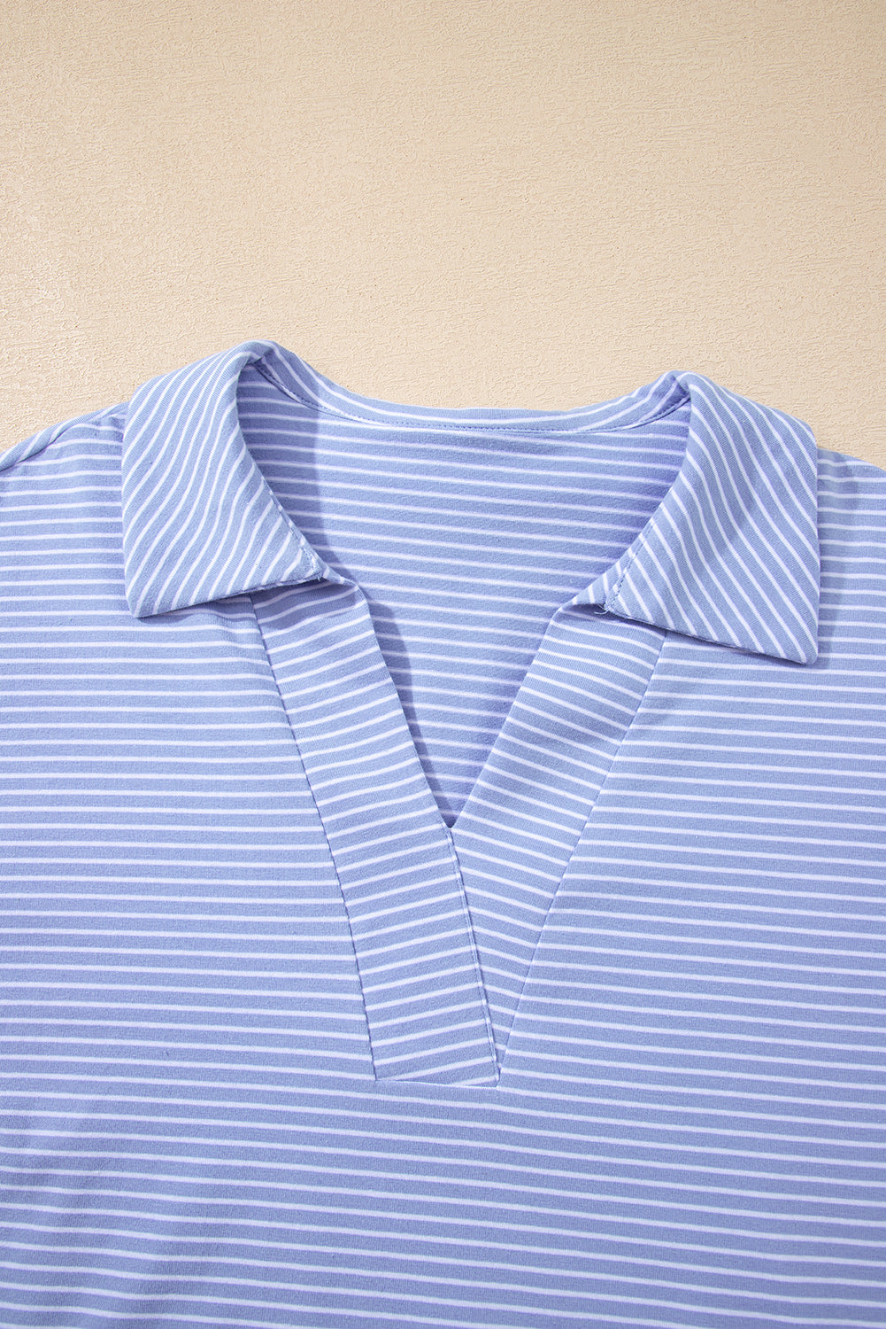 Sky blue stripe dolman sleeve polo shirt with drawstring shorts set by Modern Grace, made of cotton and elastane, casual two-piece outfit.