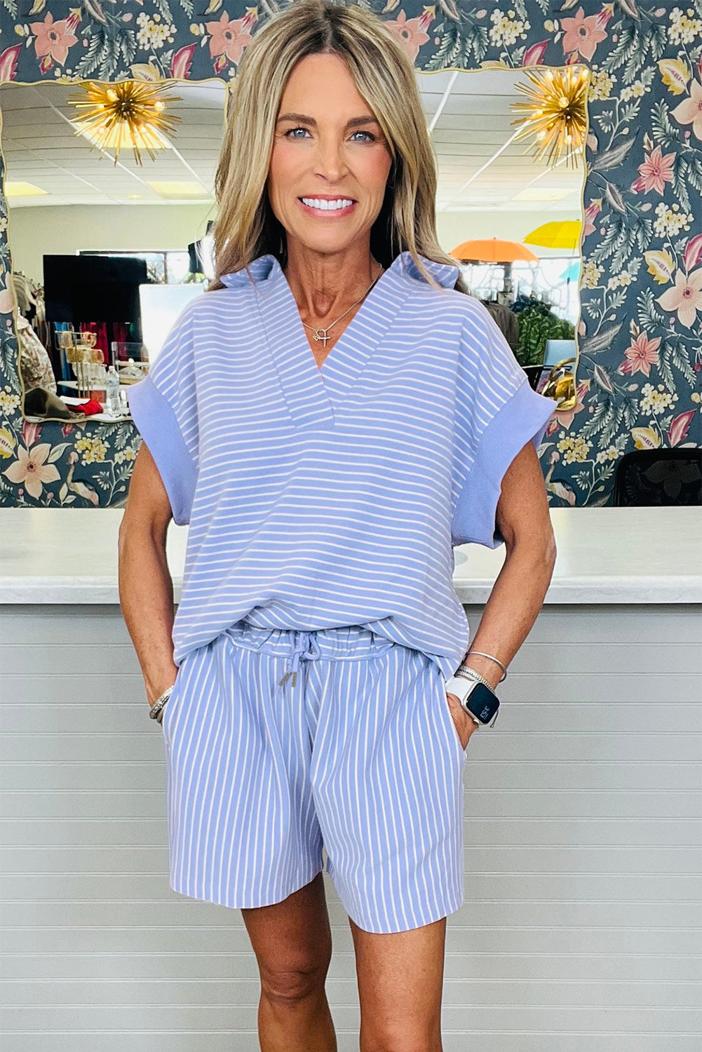 Sky blue stripe dolman sleeve polo shirt and drawstring shorts set by Modern Grace, casual two-piece cotton and elastane ensemble.