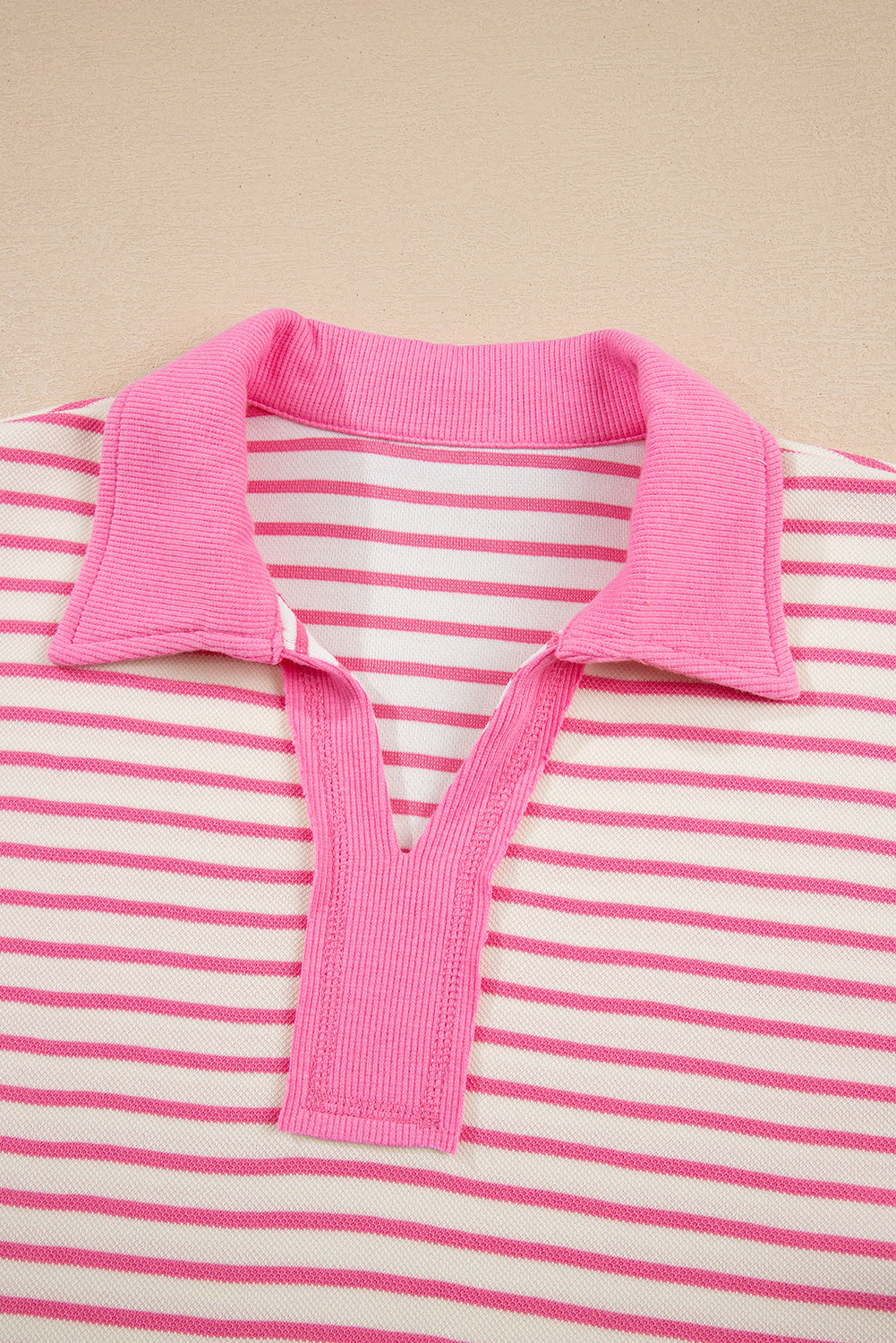 Pink stripe collared V-neck drop shoulder pullover and matching skort set by Modern Grace, stylish two-piece outfit for women.