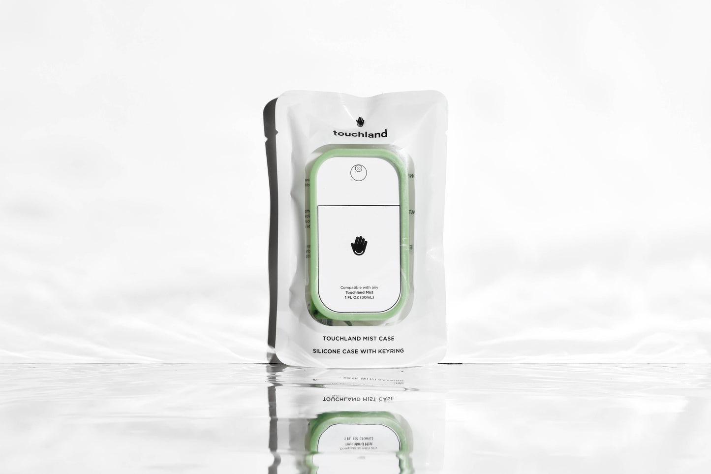 Touchland Mist Case in Matcha Green, a sleek protective cover for hand sanitizer bottles, with a vibrant green design.
